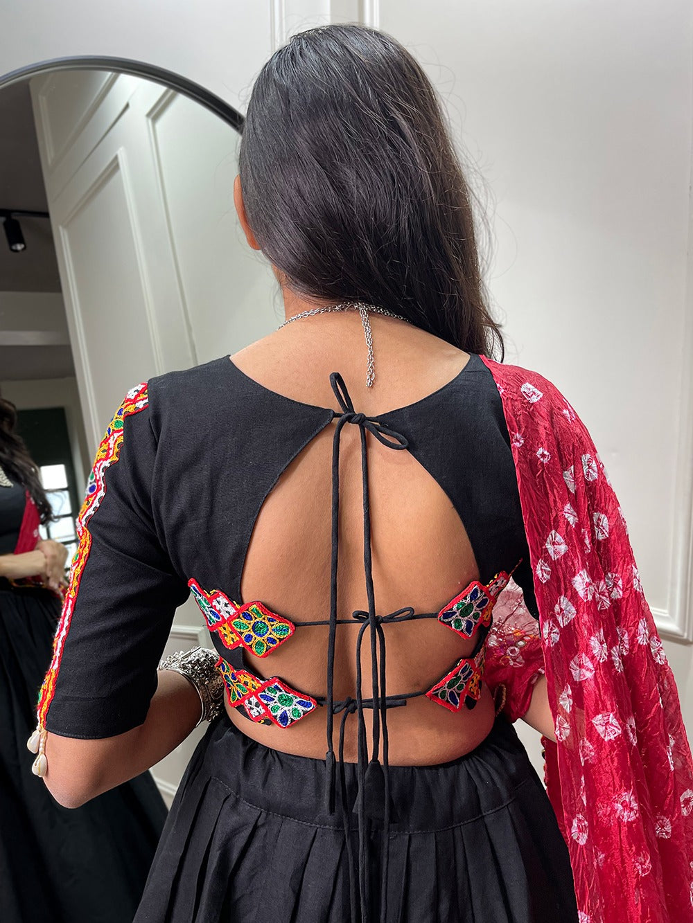 Can I wear a backless lehenga choli in a relative's marriage? What are some  suggestions? - Quora